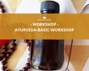 Titelbild des Workshops Ayurveda Basic, eine kleine Glasflasche liegt vor einem Yogamala auf einem in braun und weiss gehaltendem Tischtuch